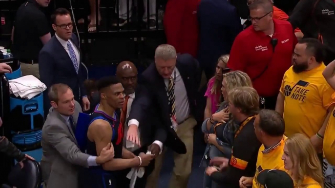 Russell Westbrook slaps a cellphone out of a spectator's hand after Thunder were eliminated by Jazz - 28.04.2018