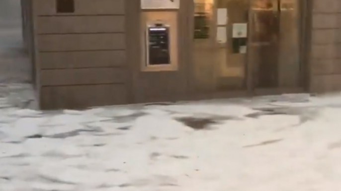 Heavy Rain and Hail Flood Street in Milan Suburb