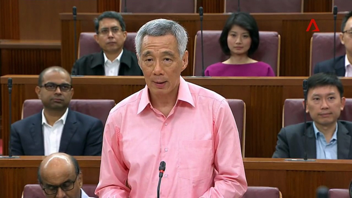 "What holds us together is not our pink NRICs, but the shared experiences that we build together over time," PM Lee Hsien Loong says nation building will always