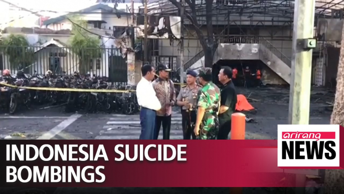 Family of suicide bombers kill at least 13 in Indonesia