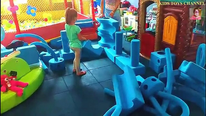 Big blue foam blocks indoor playground for kids . Many forms and sizes blocks to playing.