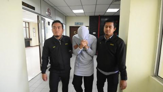 Zakat clerk charged with two counts of CBT