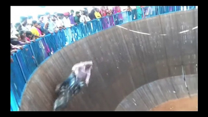 Indian girl's best bike stunts in well of death...!!!!