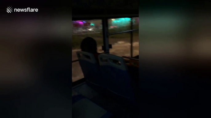 Terrifying moment heavy rain causes bus to flood in Hanoi