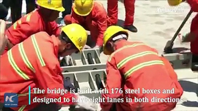 Breaking several records!  World's largest-span steel-box beam suspension bridge nears completion in Guangdong, China.