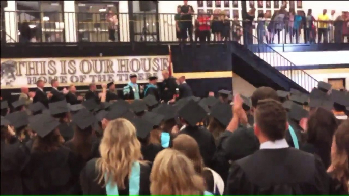 Teen Paralyzed in ATV Accident Walks Across Stage at Graduation