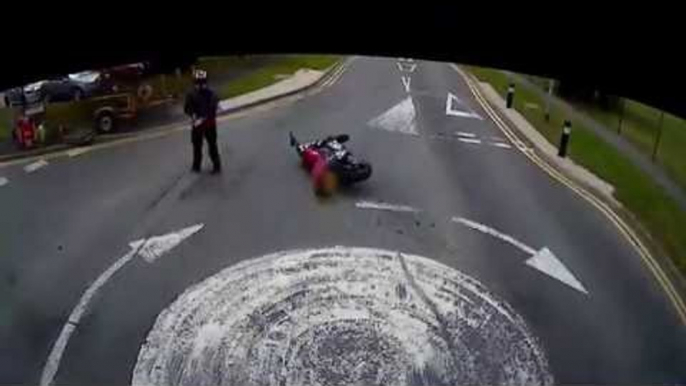 Brainless biker overtakes lorry, crashes into van and angrily throws gloves in hedge