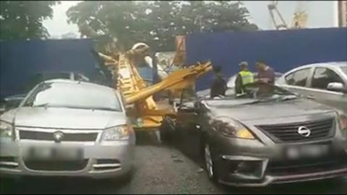 Toppled crane damages four cars near Dang Wangi police HQ