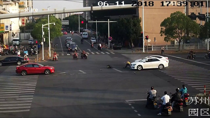 Delivery man flips and lands on his feet after being hit by car