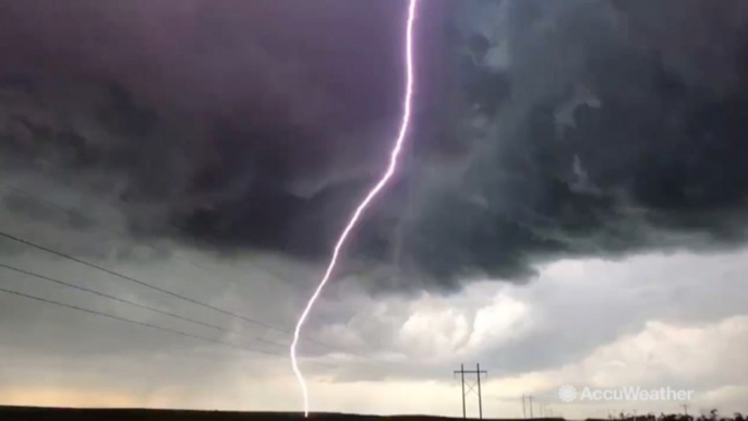 AccuWeather storm chaser, Reed Timmer, screams and runs for cover after close call with lightning