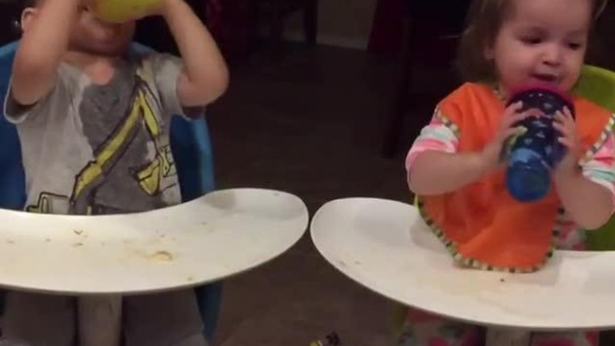 Twin Toddlers Can't Stop Laughing While Drinking Juice
