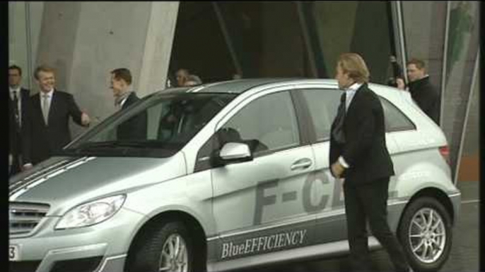 Michael Schumacher and Nico Rosberg driving  Mercedes Benz B-Class F-Cell