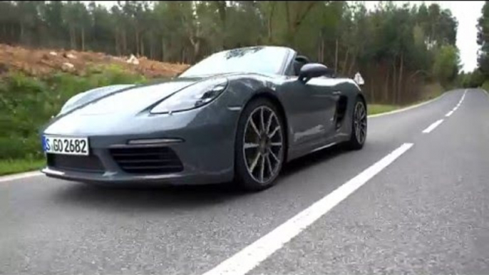 Porsche 718 Boxster in Graphite Blue Metallic Driving Video | AutoMotoTV