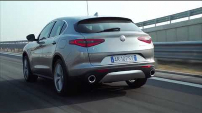 Alfa Romeo Stelvio Driving Video in Grey Trailer | AutoMotoTV