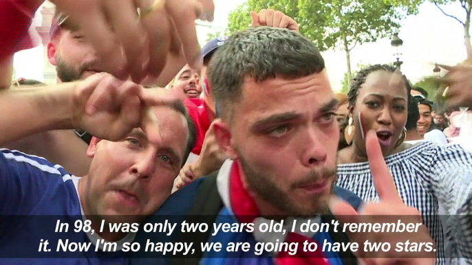 Fans react to France's World Cup victory on the Champs-Elysées