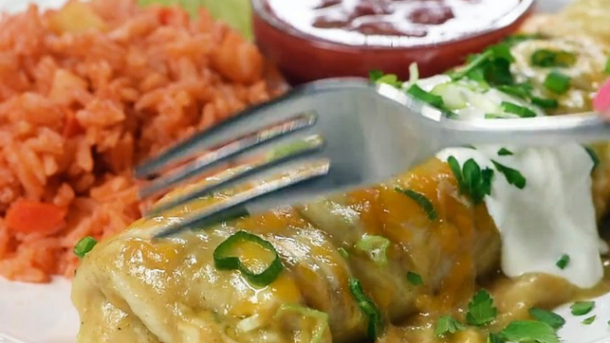 These GREEN CHILE CHICKEN SMOTHERED BURRITOS are a seriously delicious way to satisfy your craving for Mexican food. Simple ingredients, easy prep, incredible r