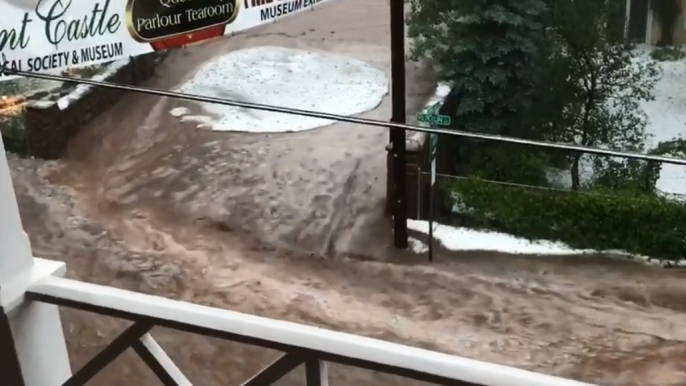 Road Becomes River as Floodwaters Cover Manitou Springs, Colorado