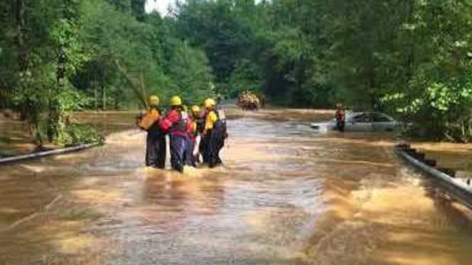 Virginia Firefighters Rescue Motorists From Flooded Roadway