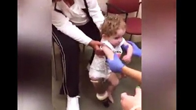 A 20-month old girl taking her first steps during a socket fitting for her prosthetic leg. She was so ready to imitate walking as soon as she was given the chan