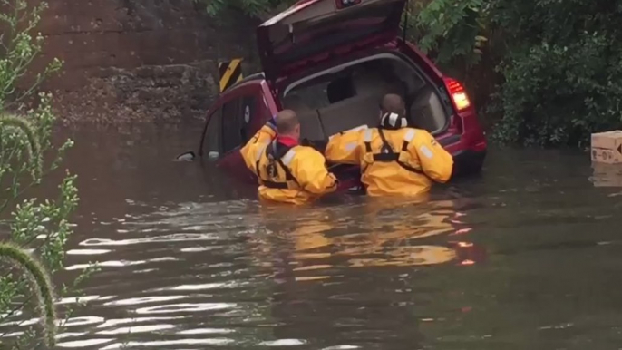 Car Trapped on Flooded Road in Watertown, Wisconsin