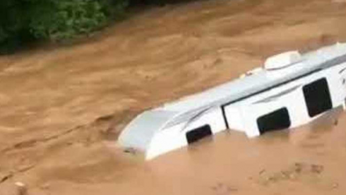 Camper Floats Down Flooded Pennsylvania Creek