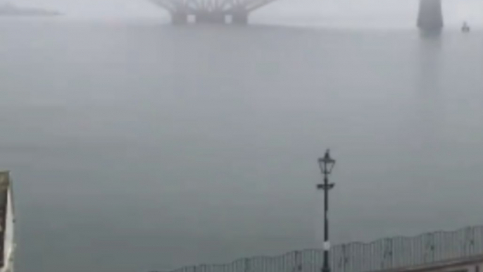 Timelapse of Edinburgh's Forth Rail Bridge Emerging From Behind Heavy Fog