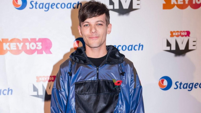 Louis Tomlinson wants to give Simon Cowell a makeover