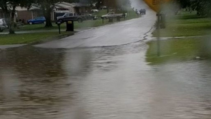 Car Drives Through Flooded Road in Soddy-Daisy, Tennessee