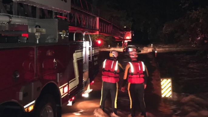 Firefighters Rescue Family Trapped in Car by Texas Floods