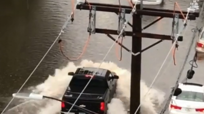 Cars Drive Through Floodwaters in Stamford, Connecticut