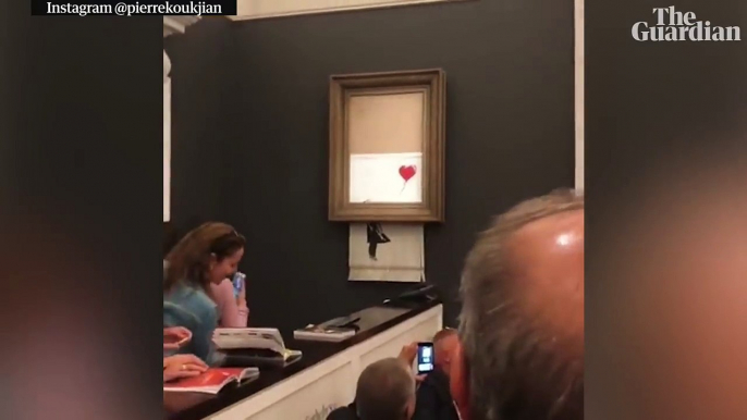Banksy artwork self-destructs after selling at auction for £1m