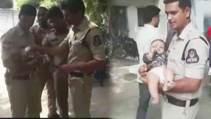 Hyderabad : Telangana Police Babysits Kid while Mother appears for Exam | Oneindia News