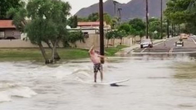 Arizona Man Attempts to Surf Hurricane Rosa Floodwaters