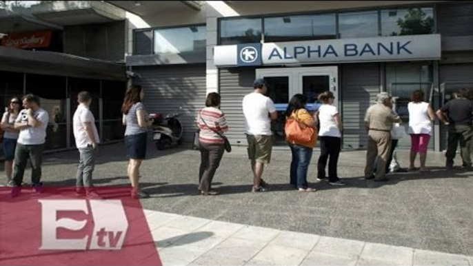 Bancos en Grecia vuelven a sus actividades / Titulares de la tarde