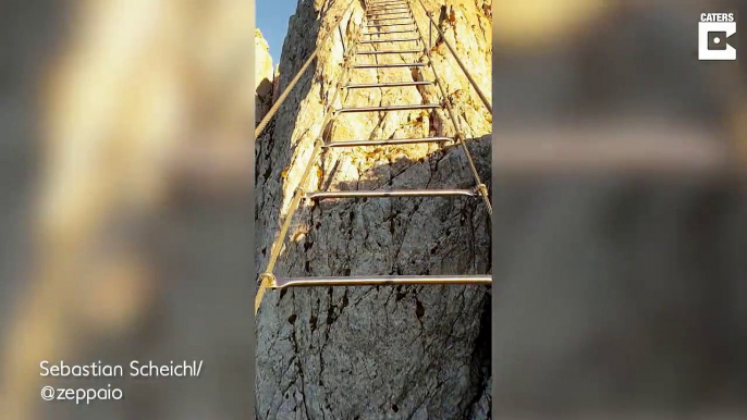 Huge ladder strung between two mountains looks like the real stairway to heaven