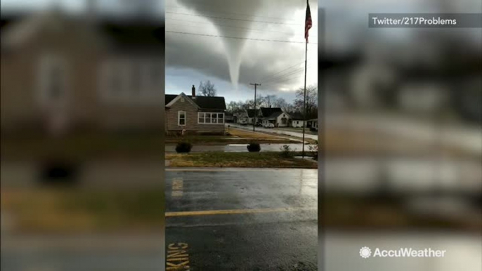 Large tornado looms ominously overhead