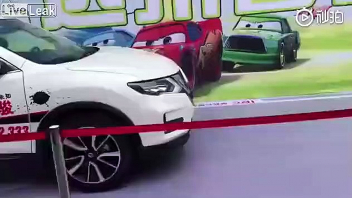 Woman test the safety feature of a brand new SUV