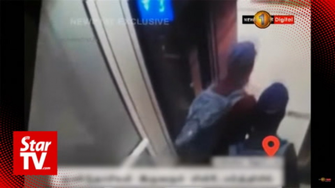 Surveillance video shows two suspected suicide bombers in hotel before blast