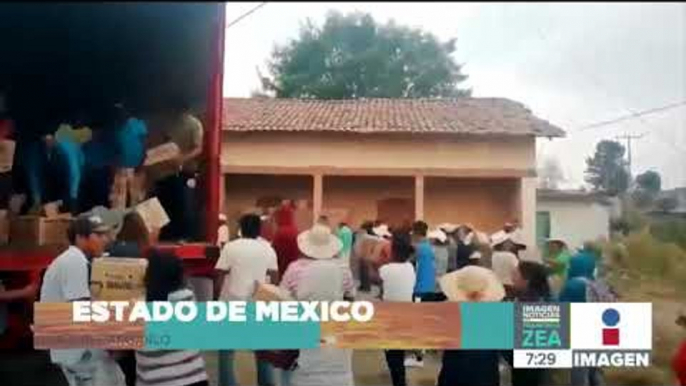 En lugar de hacer rapiña, habitantes ayudan a recargar un tráiler | Noticias con Francisco Zea