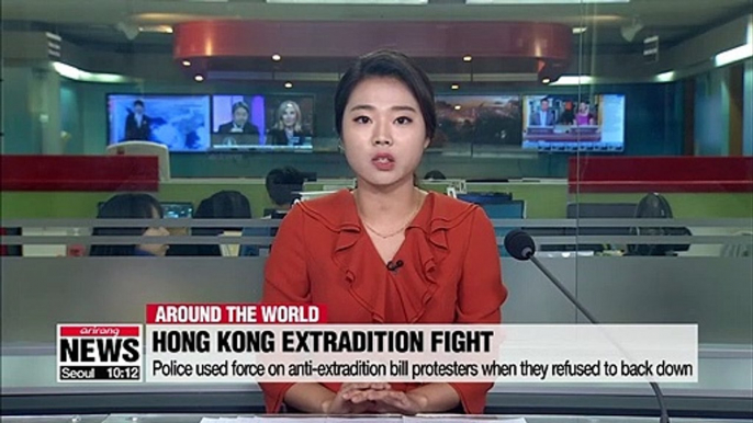 Hong Kong police declare China extradition protest 'a riot' as rubber bullets and tear gas fired at crowd