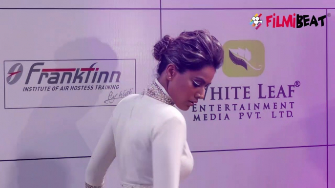 Nia Sharma looks bold in white lehenga; Check Out | FilmiBeat