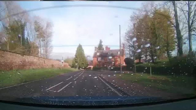 Terrifying moment Audi avoids head-on collision