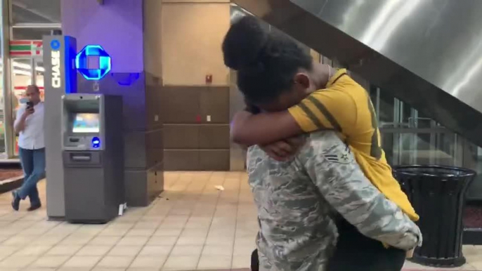Military Woman Surprises Girlfriend by Hiding Behind Huge Teddy Bear