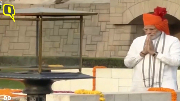 Prime Minister Narendra Modi pays tribute to Mahatma Gandhi at Rajghat