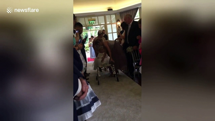 Heartwarming moment 4-year-old daughter walks for the first time at mother's wedding