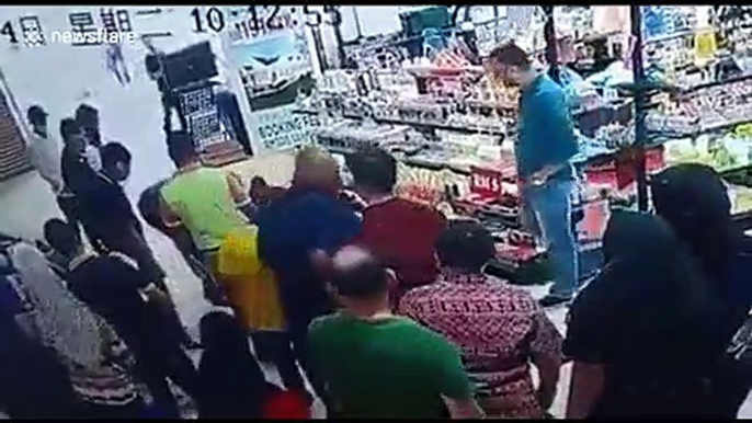 Brave shop assistant takes down suspected thief like a Hollywood action hero