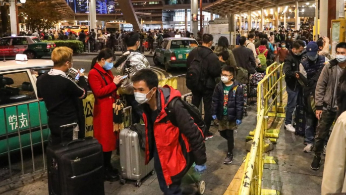 Coronavirus: cross-border commuters rush back to Hong Kong before city imposes quarantine measures