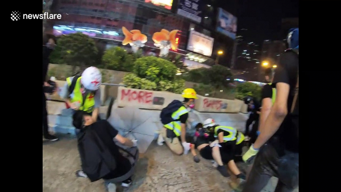 Very young Hong Kong protester is treated for rubber bullet injuries