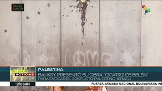 Artista Banksy presenta obra alusiva al conflicto palestino-israelí