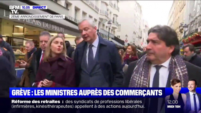 Le ministre de l'Économie rencontre des commerçants touchés par la grève dans le centre de Paris